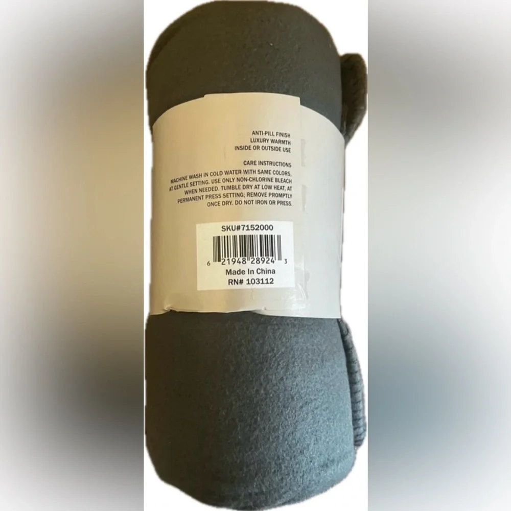 50x60 Polar fleece gray throw. 100% Polyester. New with tags.